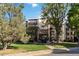 Building exterior with landscaping and entrance at 3460 S Poplar St # 307, Denver, CO 80224