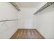 Large walk-in closet with double hanging rods at 3460 S Poplar St # 307, Denver, CO 80224