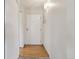 Bright condo entryway with hardwood floors and white walls at 3460 S Poplar St # 307, Denver, CO 80224