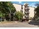 Building exterior showcasing landscaping and parking at 3460 S Poplar St # 307, Denver, CO 80224