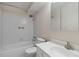 Bathroom features a shower/tub combo and vanity at 3460 S Poplar St # 307, Denver, CO 80224