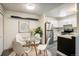 Bright kitchen with stainless steel appliances and white cabinets at 7881 Allison Way # 301, Arvada, CO 80005