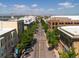 Aerial view of street with shops and mountain backdrop at 453 S Quay St, Lakewood, CO 80226