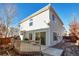 Home's exterior with deck and fenced backyard at 20000 Mitchell Pl # 71, Denver, CO 80249