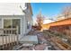 Backyard with patio, landscaping, and wooden border at 20000 Mitchell Pl # 71, Denver, CO 80249