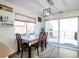 Dining area with sliding glass doors leading to a deck at 20000 Mitchell Pl # 71, Denver, CO 80249
