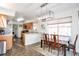 Bright dining area with a table and chairs, adjacent to the kitchen at 20000 Mitchell Pl # 71, Denver, CO 80249