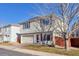 Two-story house with a garage and yard at 20000 Mitchell Pl # 71, Denver, CO 80249