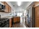 Kitchen with stainless steel appliances and island at 20000 Mitchell Pl # 71, Denver, CO 80249
