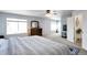 Main bedroom with carpeted floor, dresser, and TV at 20000 Mitchell Pl # 71, Denver, CO 80249