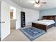 Spacious main bedroom with a large bed and carpet at 20000 Mitchell Pl # 71, Denver, CO 80249