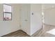 Bright entryway with light flooring and white walls at 10231 E 62Nd Pl, Denver, CO 80238