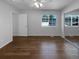 Bedroom with wood floors and a view of the backyard at 544 James St, Highlands Ranch, CO 80126