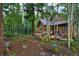 Landscaped yard with a path leading to the home at 120 Windwood Cir, Breckenridge, CO 80424