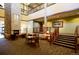 Spacious lobby with fireplace and comfortable seating at 13500 E Cornell Ave # 302, Aurora, CO 80014