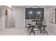 Basement wet bar with gray cabinets and dark tile backsplash at 185 W 9Th Ave, Broomfield, CO 80020