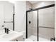 Clean bathroom with a shower and modern vanity at 7469 Skygazer St, Castle Pines, CO 80108