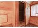 Walk-in shower with tiled walls at 7948 S Turkey Creek Rd, Morrison, CO 80465