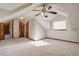 Spacious bedroom with a ceiling fan and carpet flooring at 7948 S Turkey Creek Rd, Morrison, CO 80465
