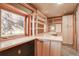 Built-in office features ample shelving and a large window at 7948 S Turkey Creek Rd, Morrison, CO 80465