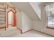 Cozy bedroom with a loft and access to a bathroom at 7948 S Turkey Creek Rd, Morrison, CO 80465