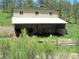 Barn with large covered area at 7948 S Turkey Creek Rd, Morrison, CO 80465