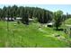 Aerial view of property with houses and stream at 7948 S Turkey Creek Rd, Morrison, CO 80465