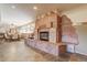Large stone fireplace as a centerpiece in the living area at 7948 S Turkey Creek Rd, Morrison, CO 80465