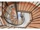 Unique spiral staircase connecting floors of the home at 7948 S Turkey Creek Rd, Morrison, CO 80465