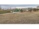 Community playground and common area with homes in background at 7203 Arkansas St, Frederick, CO 80530