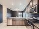 Modern kitchen with granite countertops and stainless steel appliances at 7203 Arkansas St, Frederick, CO 80530