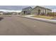 Quiet residential street with houses and well-maintained lawns at 7203 Arkansas St, Frederick, CO 80530