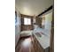 Clean bathroom featuring a bathtub, toilet, and vanity with updated countertops at 18064 E Ford Pl, Aurora, CO 80017