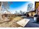 Large backyard with patio, shed and mature trees at 6584 Kline St, Arvada, CO 80004