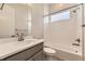Bathroom with single vanity, shower/tub combo, and toilet at 1871 Grayside Cir, Castle Rock, CO 80109