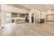 Bright and airy living room with hardwood floors and a modern fireplace at 1871 Grayside Cir, Castle Rock, CO 80109