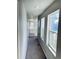 Upper hallway with multiple windows and a view of the lower level at 19085 E 66Th Ave, Denver, CO 80249