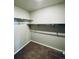 Walk-in closet with double rods and shelving at 19085 E 66Th Ave, Denver, CO 80249