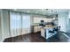 Modern kitchen with granite countertops and stainless steel appliances at 19085 E 66Th Ave, Denver, CO 80249