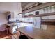 Kitchen with white cabinets and a breakfast bar at 11008 Vrain Ct, Westminster, CO 80031