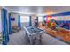 Game room features a pool table, bar area, and Colorado-themed mural at 11008 Vrain Ct, Westminster, CO 80031