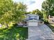 Two-story house with attached garage, large yard, and mountain views at 11008 Vrain Ct, Westminster, CO 80031