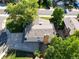 House and backyard, aerial view, showing driveway and landscaping at 11008 Vrain Ct, Westminster, CO 80031