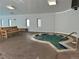Indoor hot tub with surrounding seating at 9315 E Center Ave # 11A, Denver, CO 80247