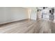 Eat-in kitchen with gray cabinets and modern appliances at 9315 E Center Ave # 11A, Denver, CO 80247