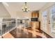 Sunlit dining area with hardwood floors and access to backyard at 850 Quarterhorse Trl, Castle Rock, CO 80104