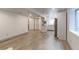 Open basement area with adjacent kitchen and ample living space at 493 N 48Th Ave, Brighton, CO 80601