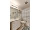 Clean bathroom with white vanity, shower/tub combo, and decorative shower curtain at 493 N 48Th Ave, Brighton, CO 80601