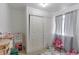 bedroom with toys and built-in closet at 493 N 48Th Ave, Brighton, CO 80601