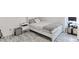 A cozy bedroom with a white bed and gray walls at 493 N 48Th Ave, Brighton, CO 80601